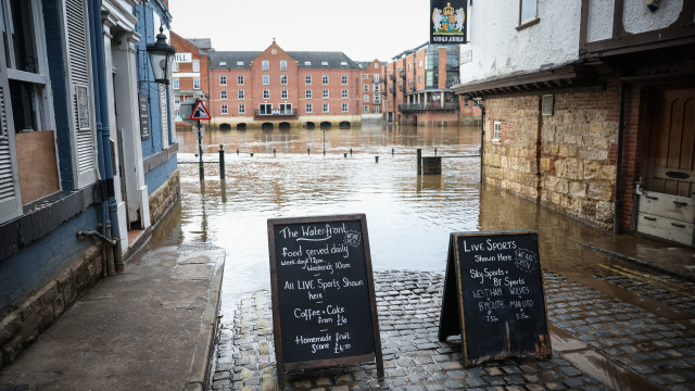 In Britain, a storm has canceled flights, trains and ferry services