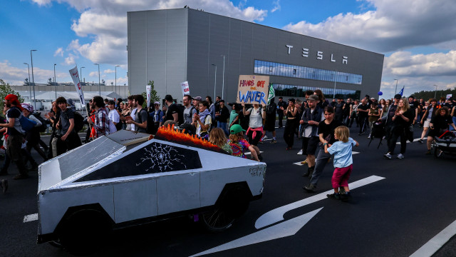 Protesters storm a Tesla factory in Germany